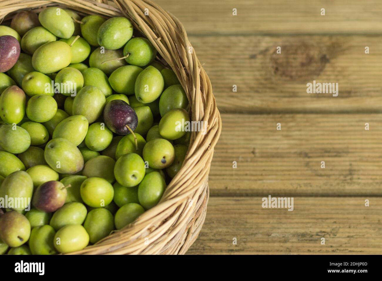 Basket of mediterranean green olives Stock Photo Alamy