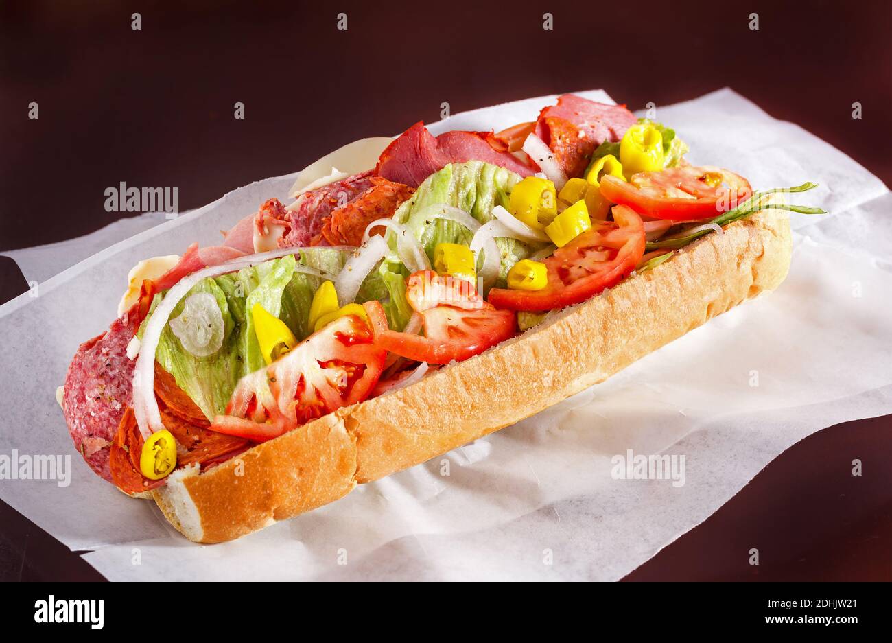 Spicy Italian Sub Sandwich on Parchment Paper Stock Photo Alamy
