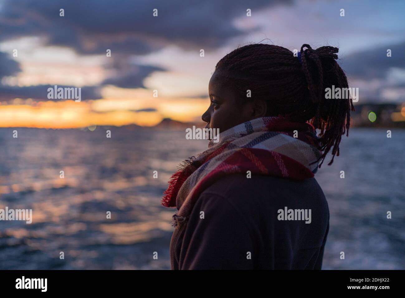Black female admiring sunset sky hi-res stock photography and images ...