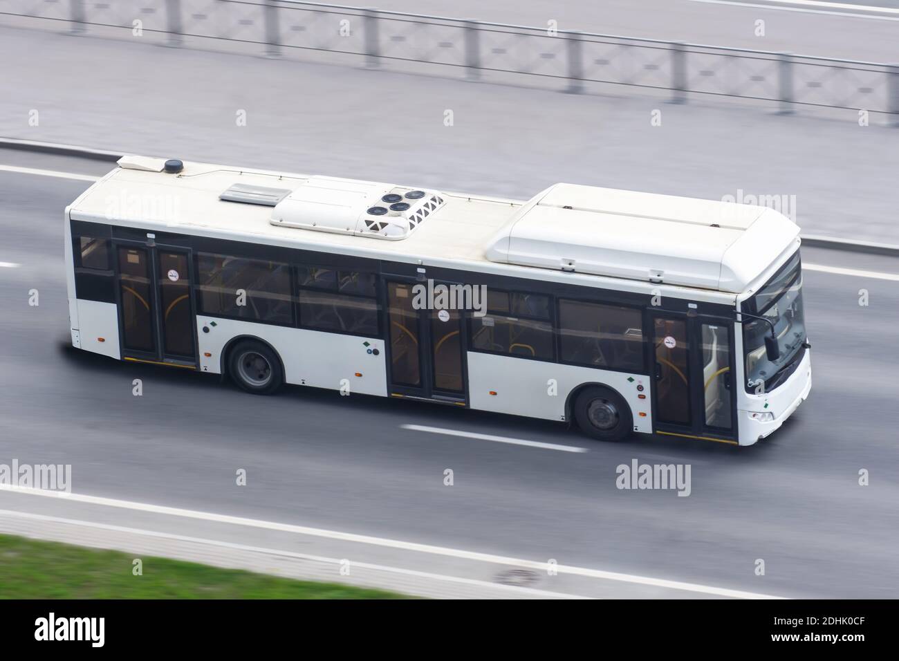 City bus travels on the highway, aerial view Stock Photo - Alamy