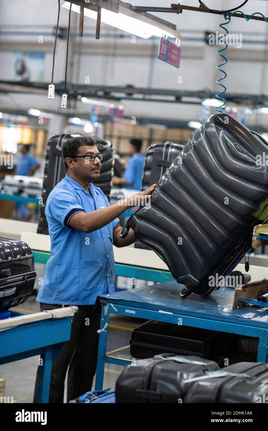 Male workers at Samsonite manufacturing unit in India Stock Photo