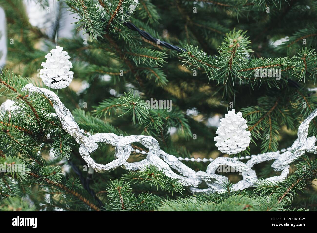 https://c8.alamy.com/comp/2DHK1GW/aluminium-foil-decoration-on-a-christmas-tree-2DHK1GW.jpg