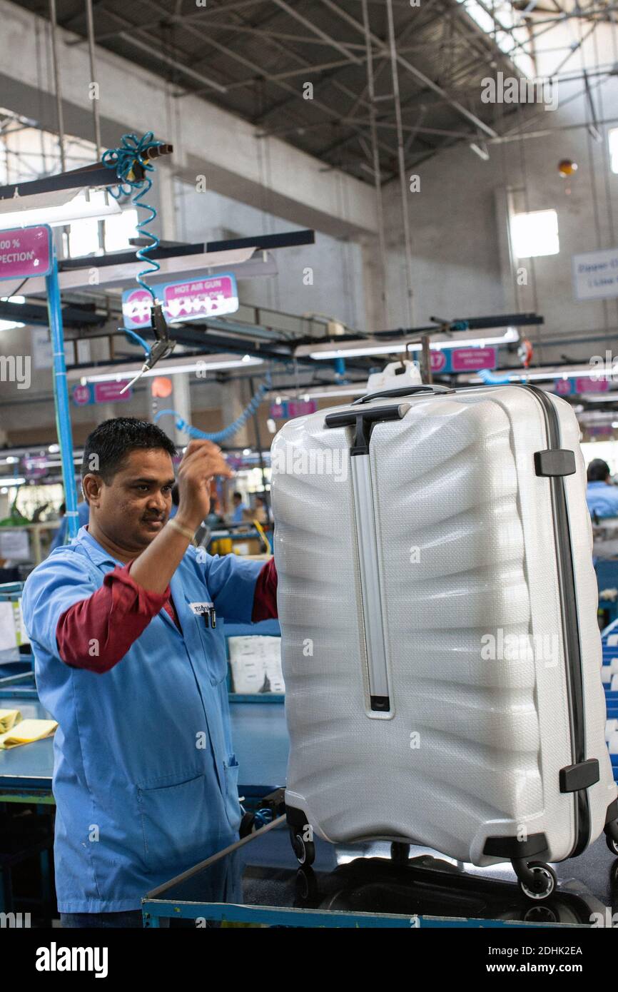 Male workers at Samsonite manufacturing unit in India Stock Photo