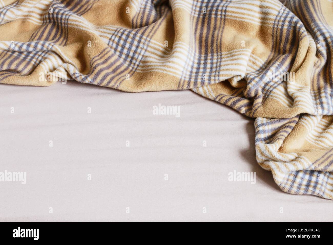Beige blanket and bedsheet. Graphic resources Stock Photo