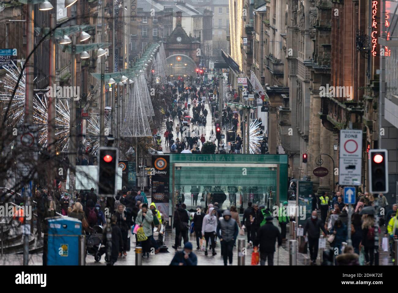 Glasgow, Scotland, UK. 11 December 2021. Covid-19 lockdown level 4 restrictions are lifted in Glasgow. Non essential businesses such as shops and restaurants can reopen from today. Pictured ; Buchanan Street much busier as shops re-opened. Iain Masterton/Alamy Live News Stock Photo