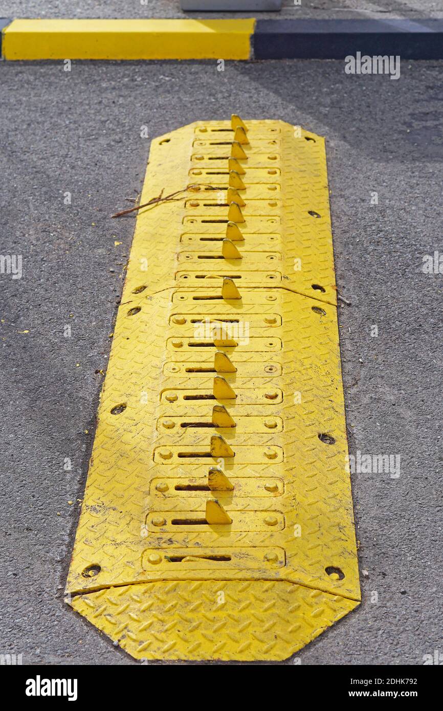 One way traffic spikes at parking lot exit Stock Photo - Alamy