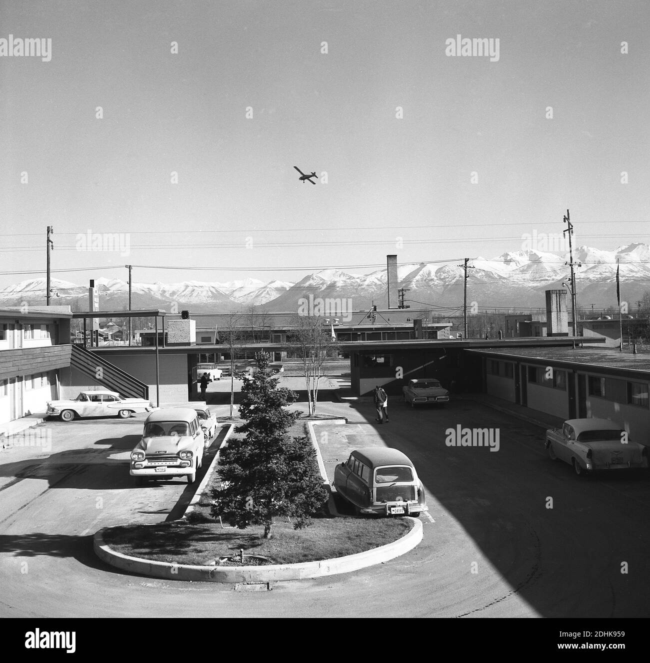 1950s, historical, Anchorage, Alaska, cars and trucks of the era motel near the airport