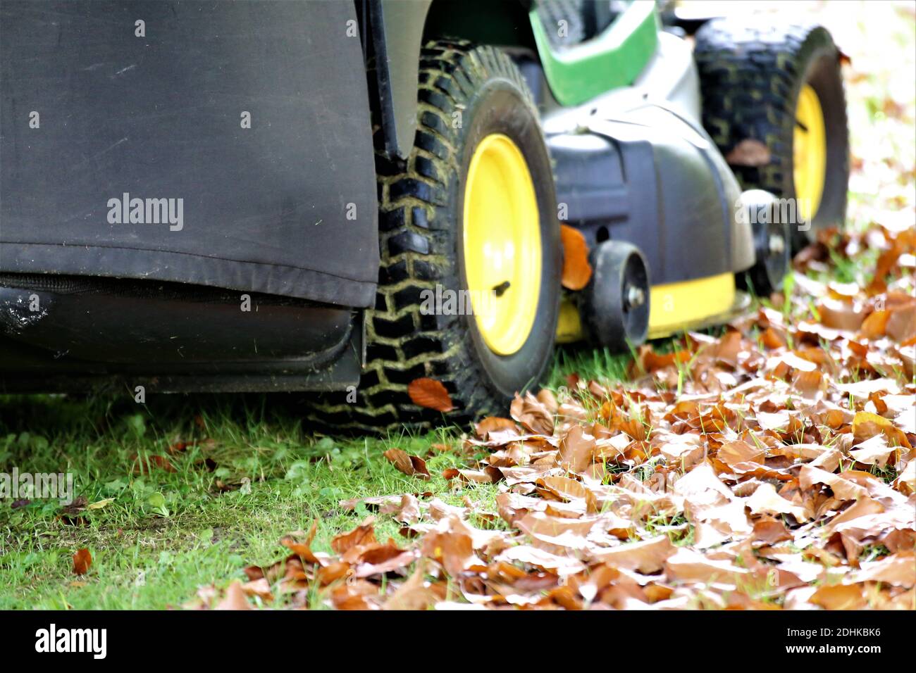 lawn mower on green grass Stock Photo