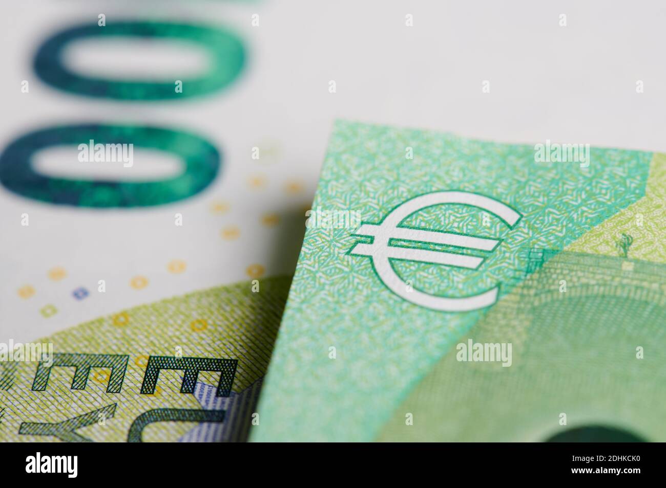 Hundred euros close up view on blurred money background Stock Photo - Alamy