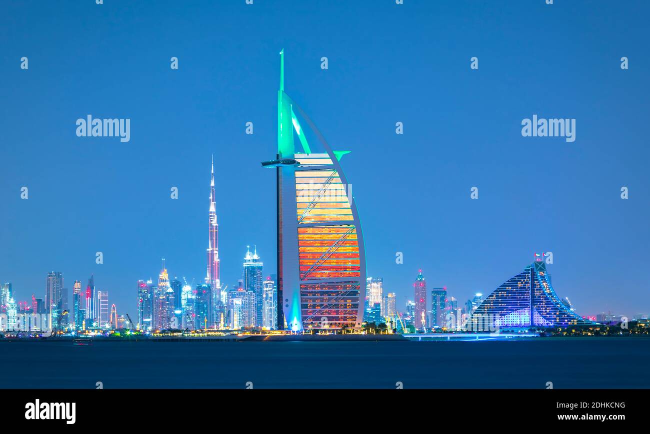 Dubai city - amazing city center skyline and famous Jumeirah beach at sunset, United Arab Emirates Stock Photo