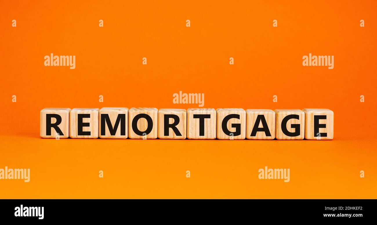 Remortgage symbol. 'Remortgage' written on wooden blocks. Business and remortgage concept. Copy space. Beautiful white background. Stock Photo