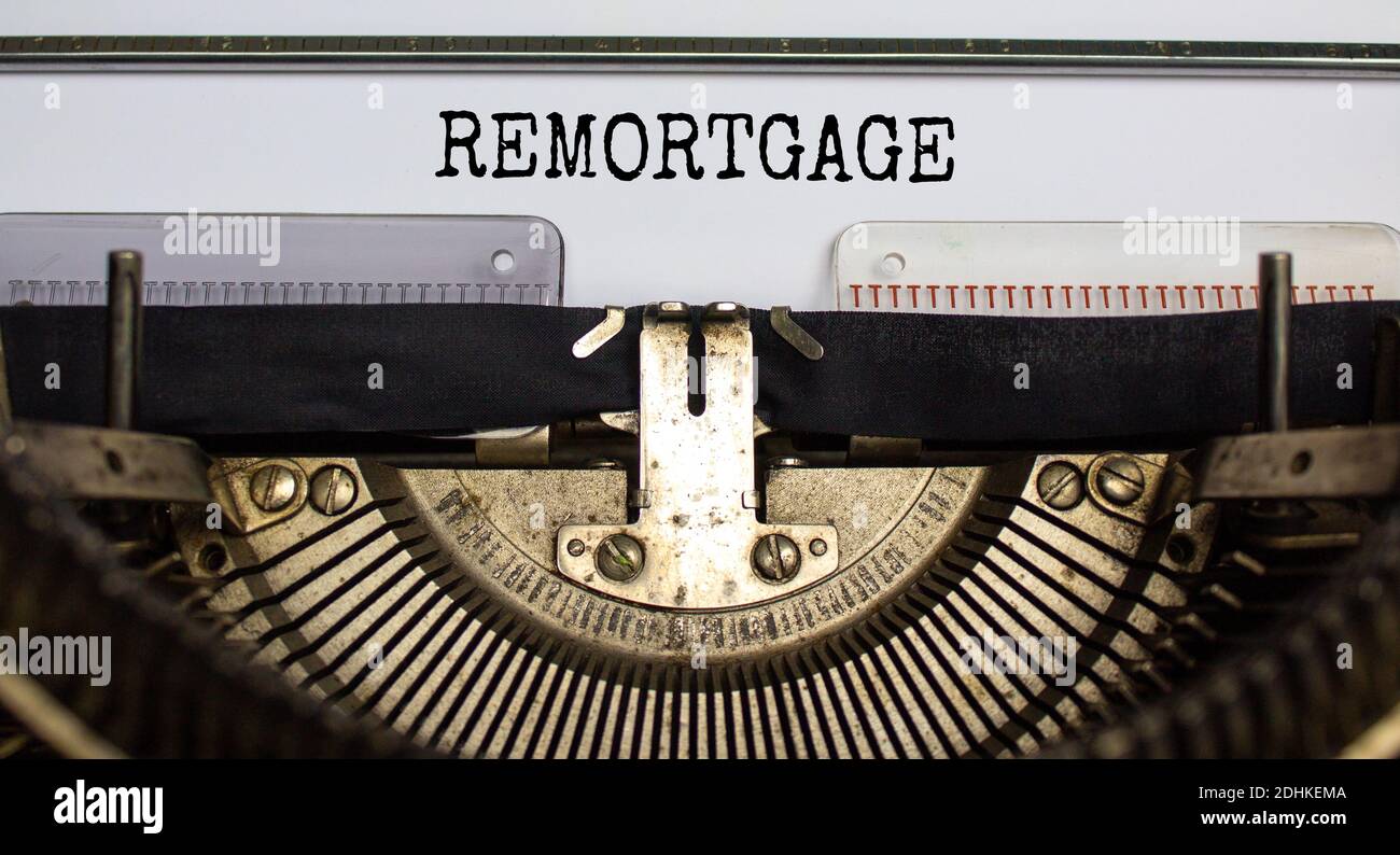 Remortgage symbol. The word 'remortgage' typed on retro typewriter. Business and remortgage concept. Stock Photo