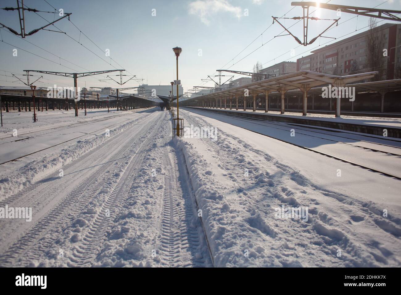 Bucharest, Romania - January 5, 2016: the Northern Railway Station (Gara de Nord) during a cold, sunny and snowy day in Bucharest. Stock Photo