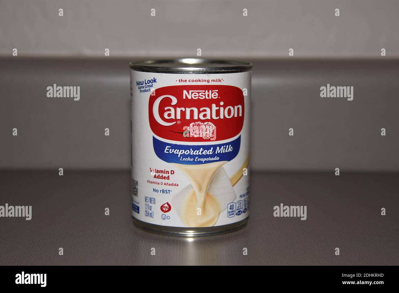 Can of Carnation Evaporated Milk by Nestle used in cooking and baking Stock Photo