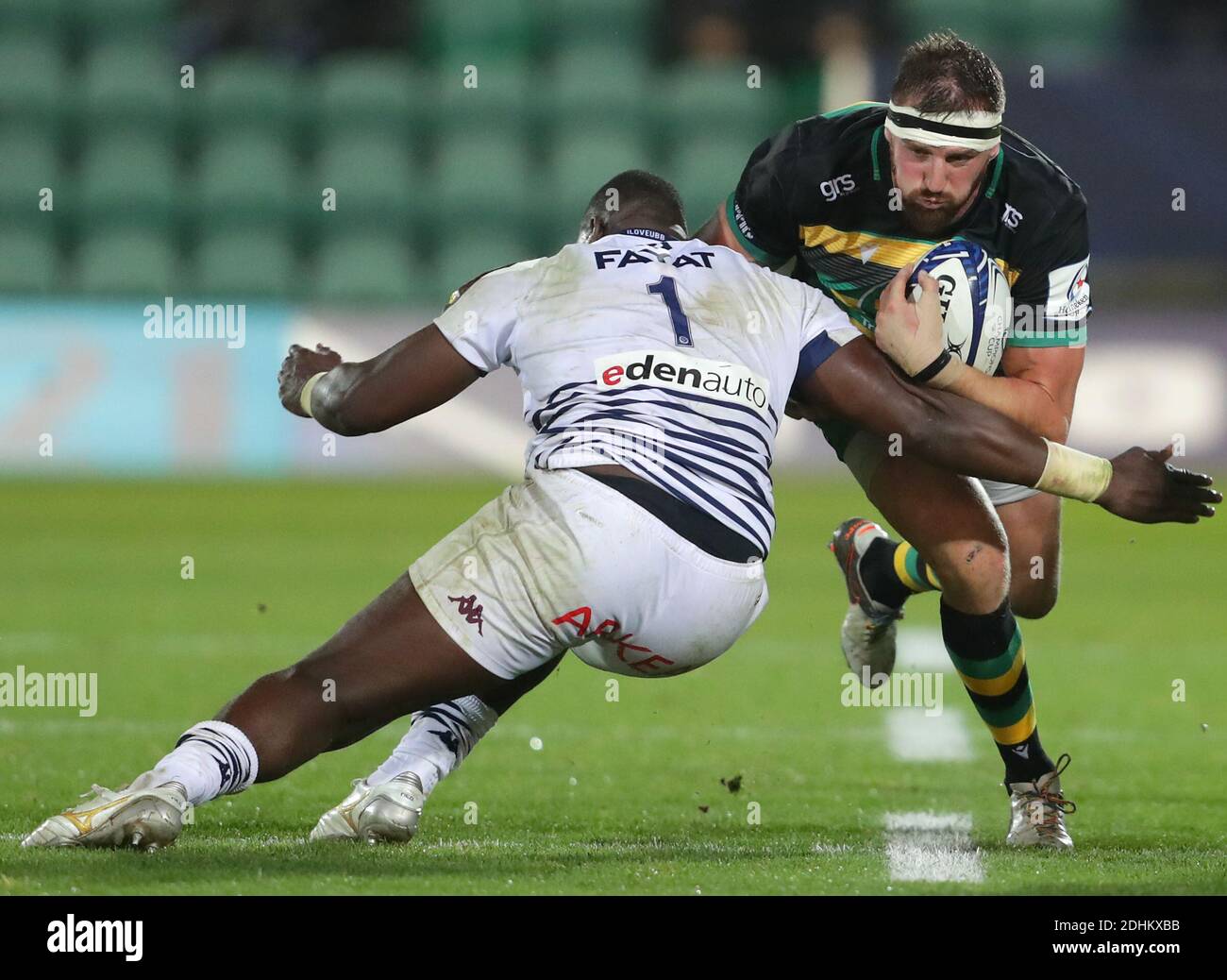 Northampton Saints' Tom Wood (right) is tackled by Bordeaux-Begles' Thierry Paiva during the European Champions Cup Group A match at Franklin's Gardens, Northampton. Stock Photo