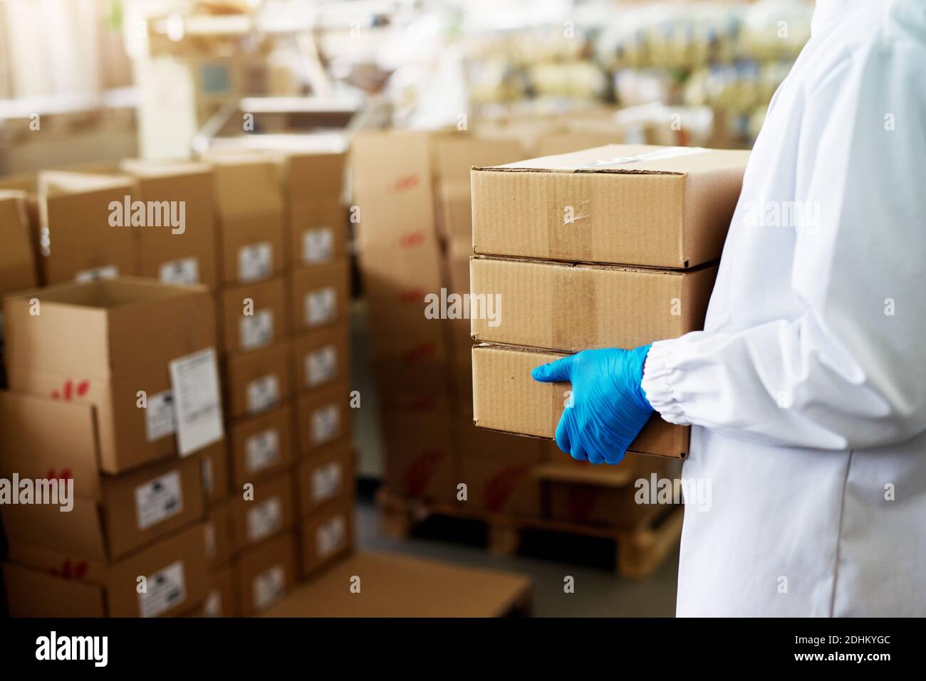 Female worker packing box in warehouse hi-res stock photography and ...
