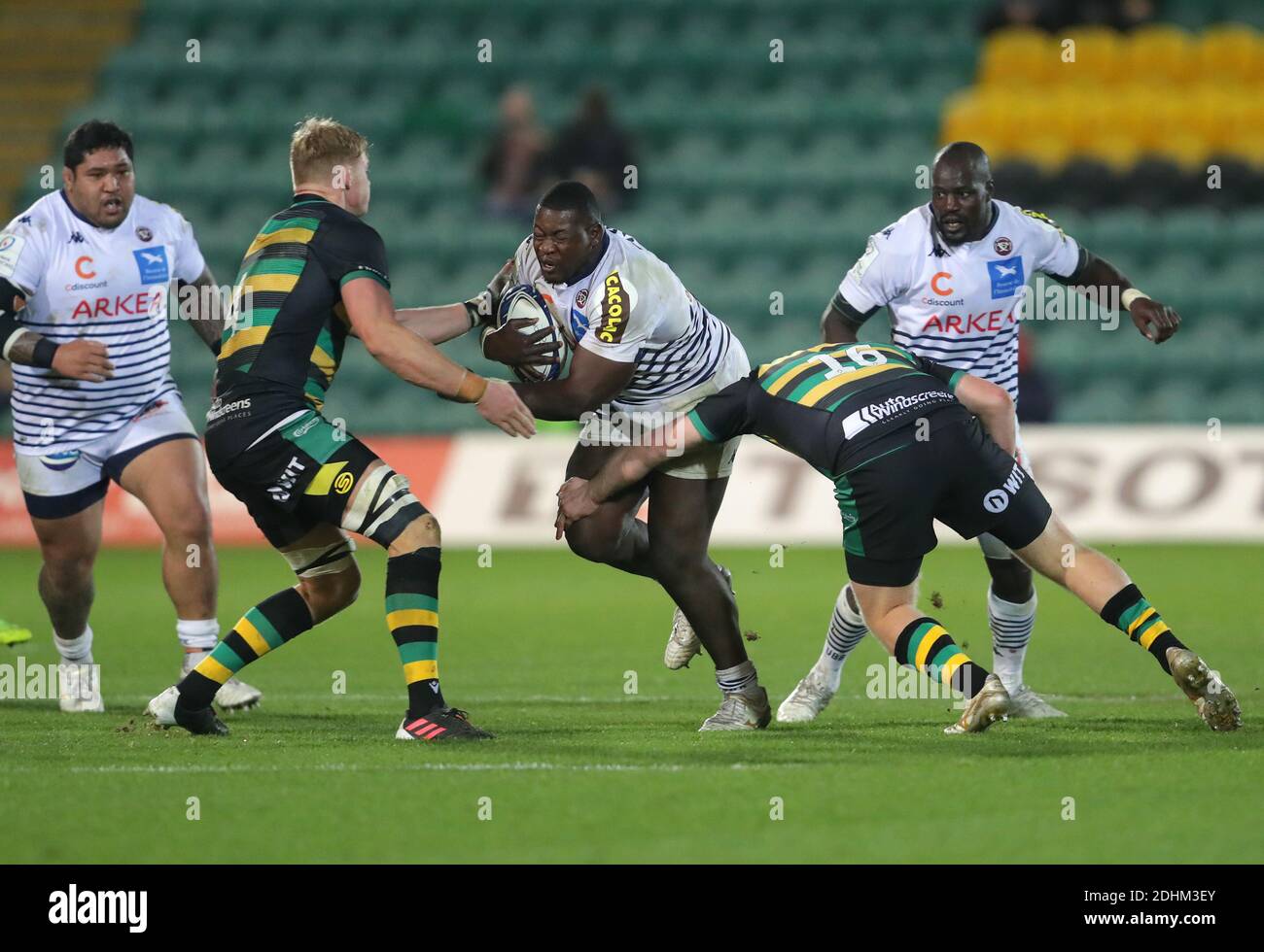 Bordeaux-Begles' Thierry Paiva is tackled by Northampton Saints' James Fish during the European Champions Cup Group A match at Franklin's Gardens, Northampton. Stock Photo