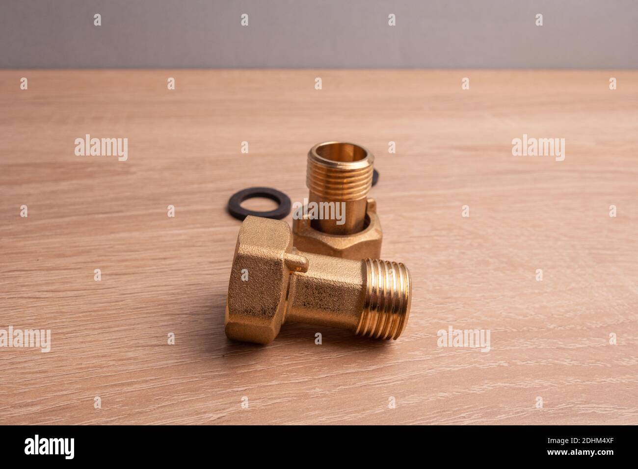 Domestic water supply brass fittings kit. 1/2 union, nuts and rubber washers Stock Photo Alamy