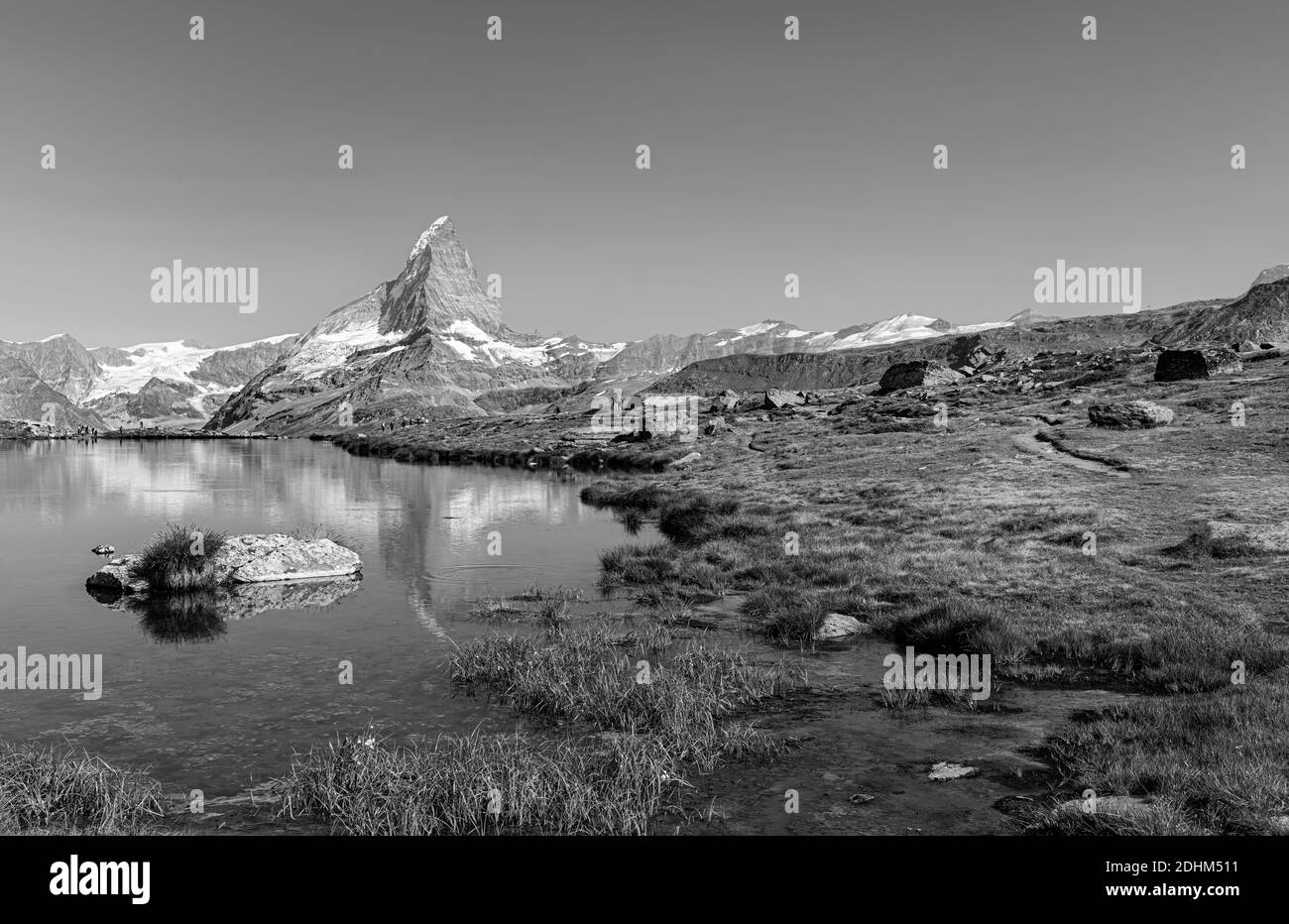 Sunset  view on Bernese range above Bachalpsee lake. Popular tourist attraction. Location place Swiss alps, Grindelwald valley, Europe. Stock Photo