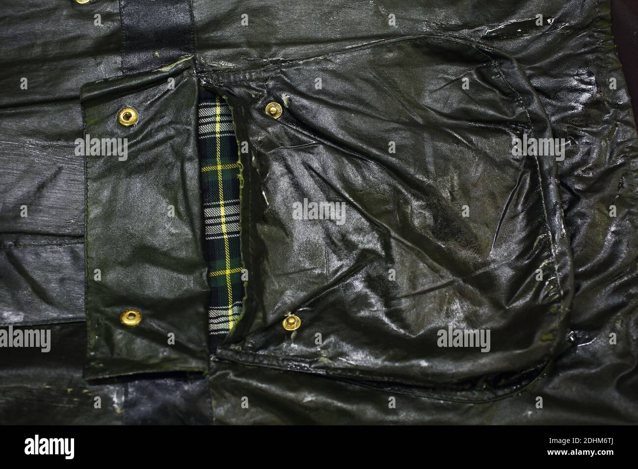 United Kingdom /South Shields/ Barbour/ Maker of jackets and other  lifestyle clothing. Rewaxing a Barbour jacket in factory Stock Photo - Alamy