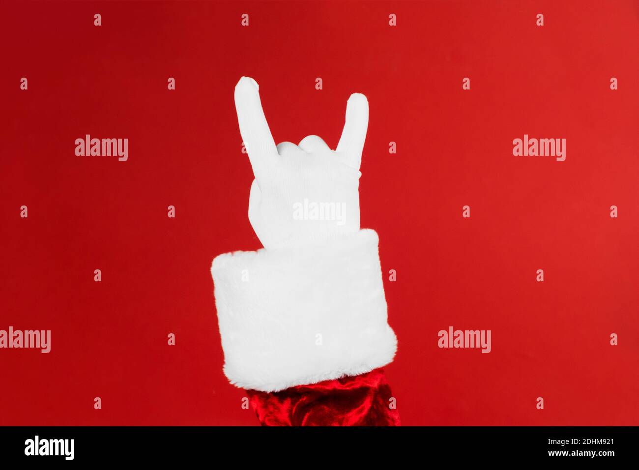 Santa Claus hand rock n roll. Christmas Rock concert poster or greeting card.  Stock Photo