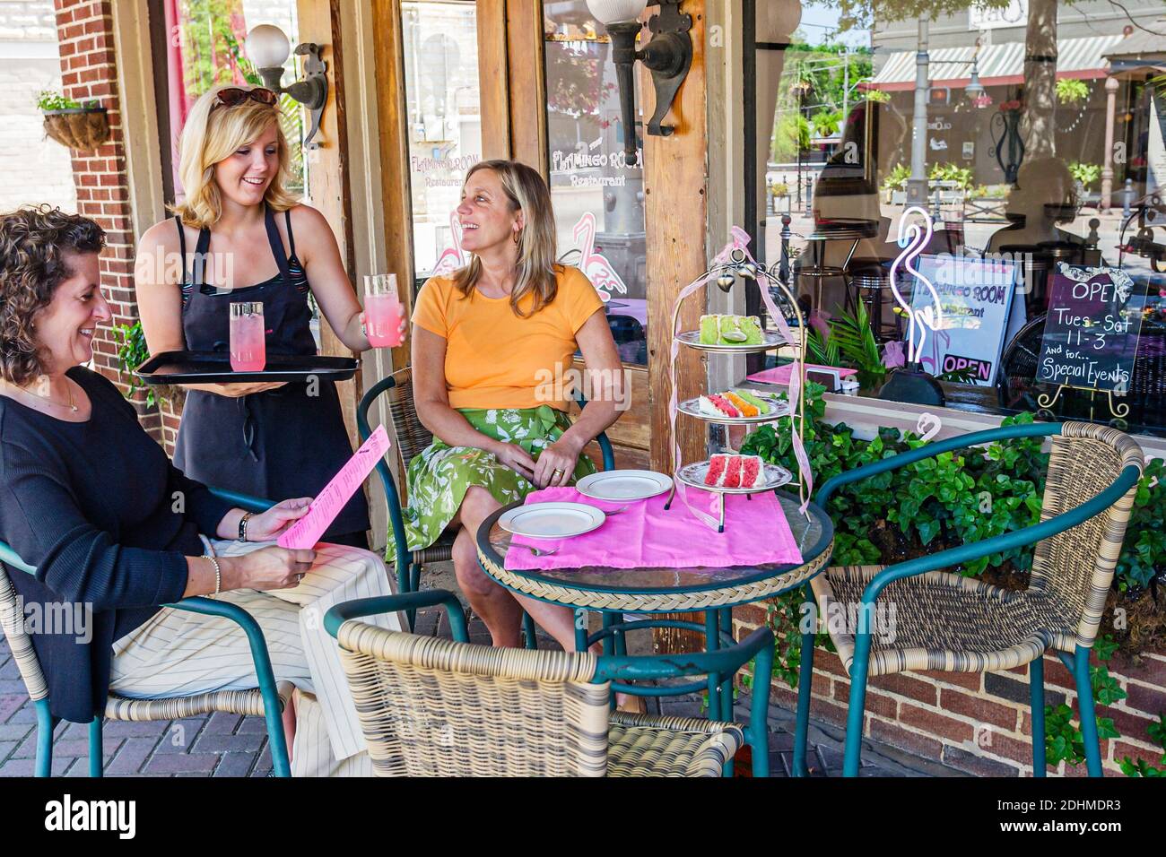 Alabama Northport The Flamingo Room restaurant,dining women waitress server serving pink lemonade, Stock Photo