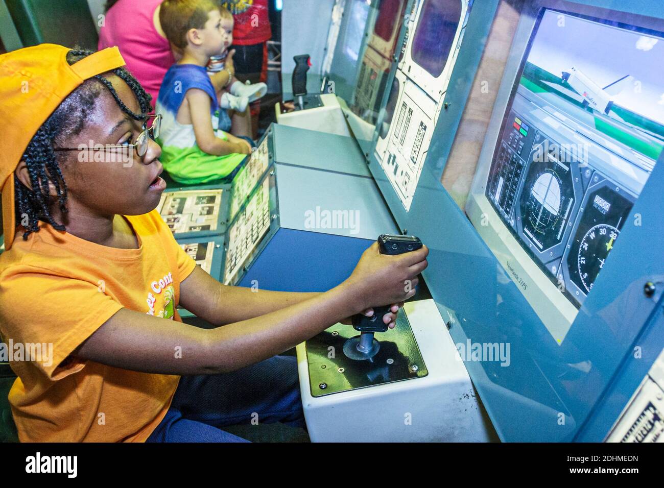 Huntsville Alabama,U.S. Space & Rocket Center centre,shuttle flight simulator Black girl student hands on exhibit, Stock Photo