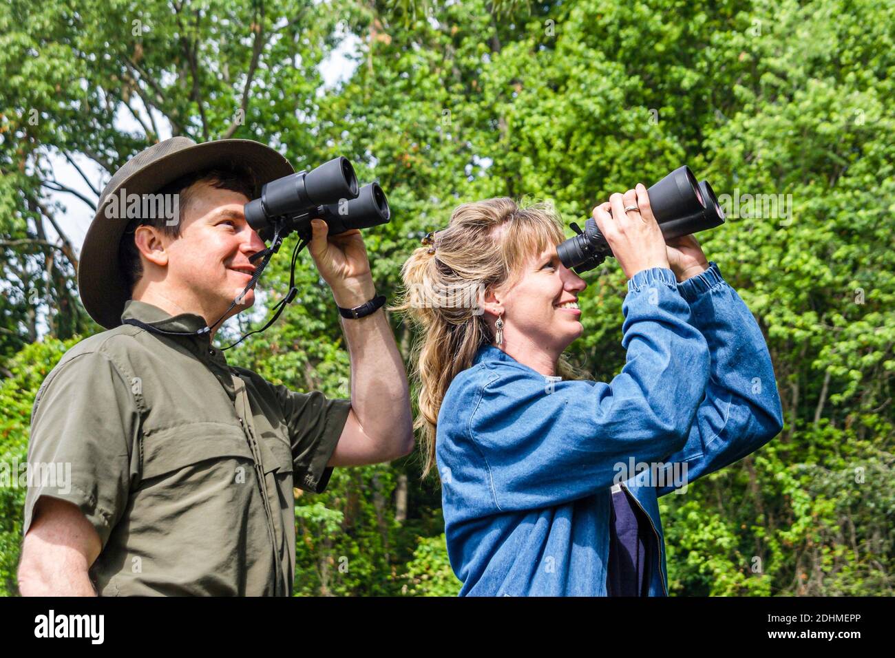 Alabama Decatur Hospitality Nature Park birding birder,man binoculars woman female couple looking, Stock Photo