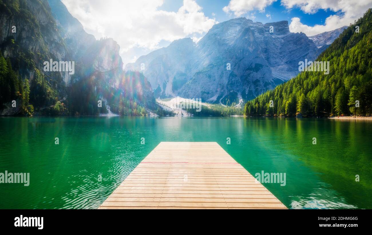 Braies Lake in Dolomites mountains Seekofel in background, Sudtirol, Italy. Lake Braies is also known as Lago di Braies. The lake is surrounded by the Stock Photo