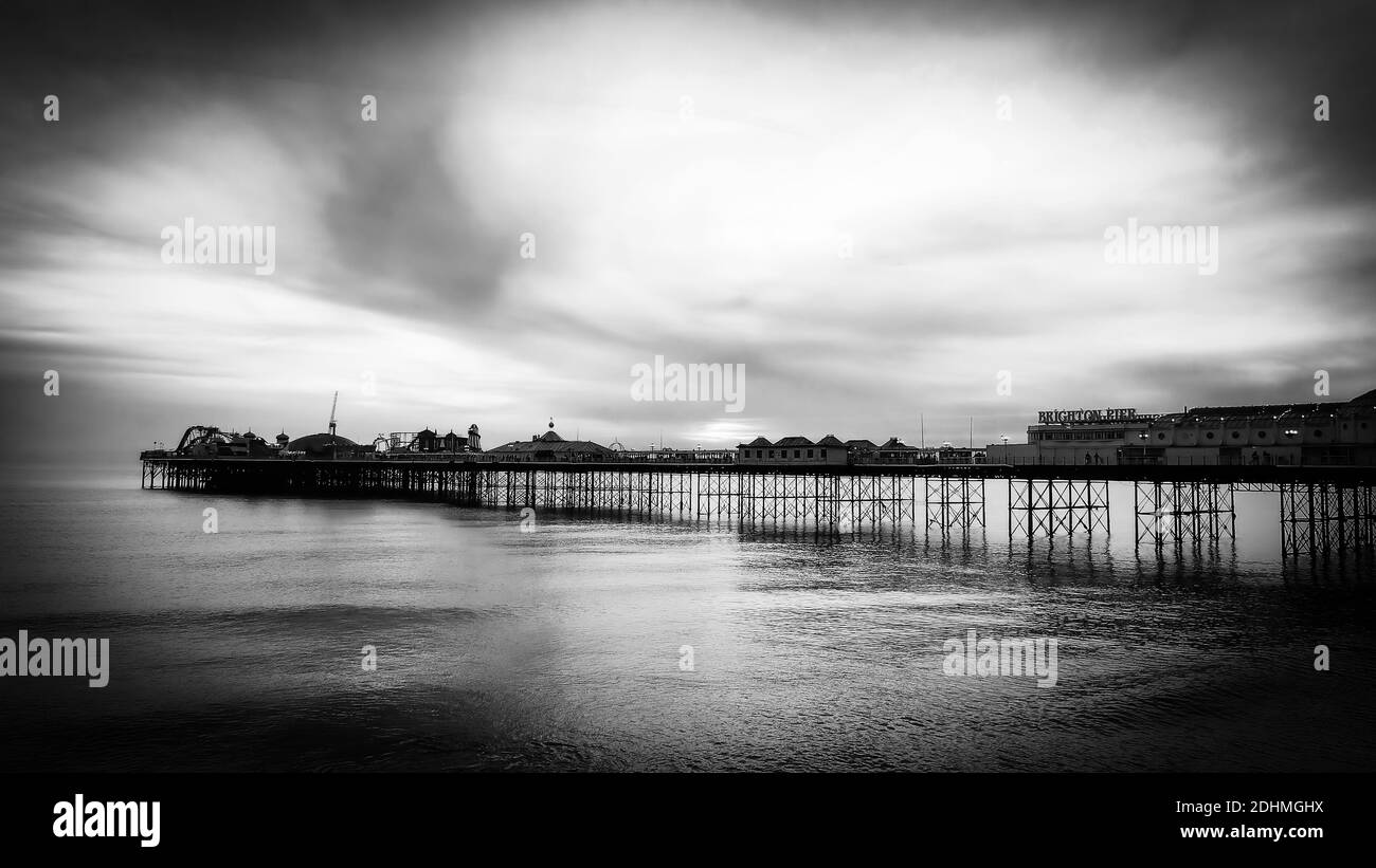 Brighton Pier iin the evening - beautiful aerial view in black and ...