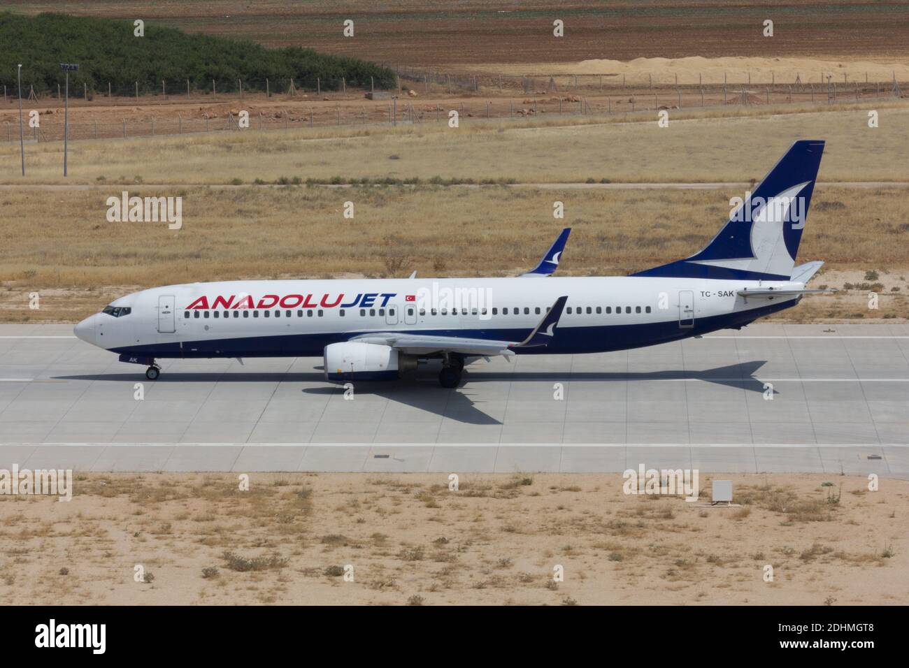 Mardin, Turkey - July 21, 2014. TC-SAK Anadolu Jet Boeing 737-800 taxiing on the apron of Mardin Airport. Stock Photo