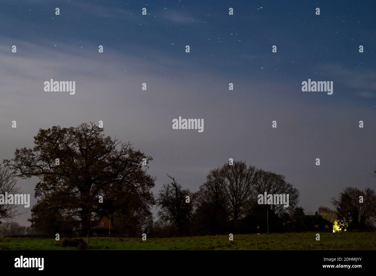 Starry night over small houses in Herefordshire countryside Stock Photo