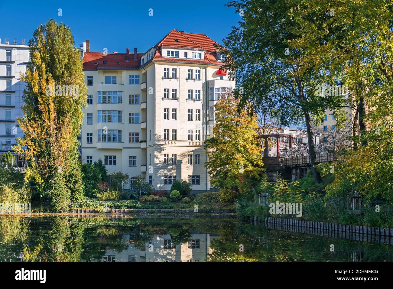 Berlin, Germany - November 7, 2020: Building of Head office of Ziegler Film, independent film and TV production company and the Lake Lietzen bridge ov Stock Photo