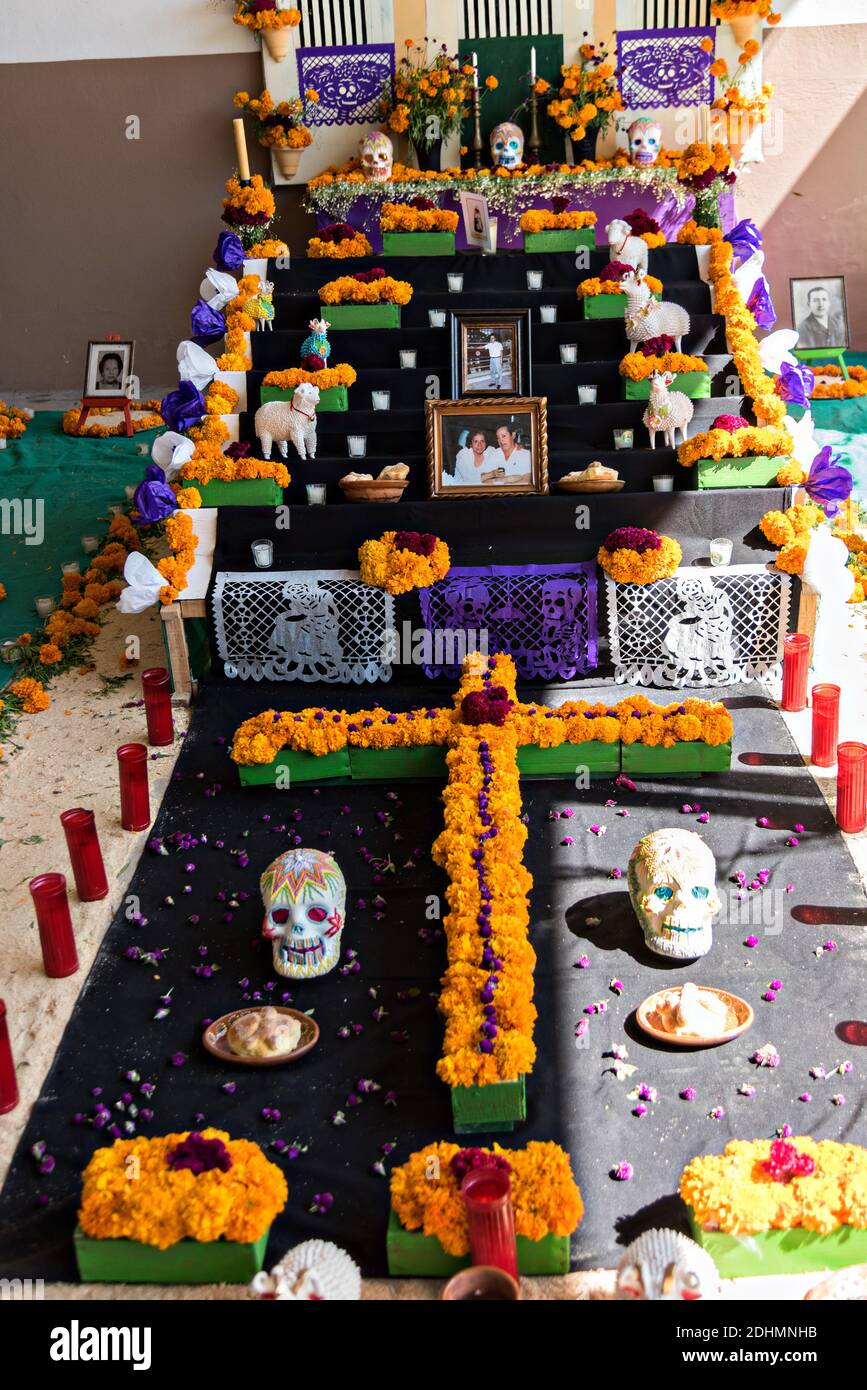 Traditional decorations on a Day of the Dead or Día de Muertos altar during the annual festival in San Miguel de Allende, Guanajuato, Mexico. The festival has been celebrated since the Aztec empire celebrates ancestors and deceased loved ones. Stock Photo