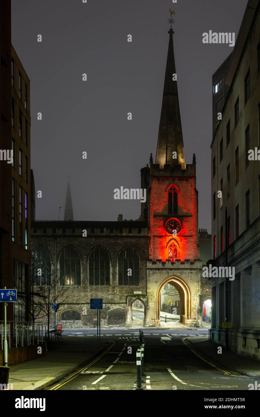 The mediaeval St John On The Wall church is lit at night in Bristol. Stock Photo