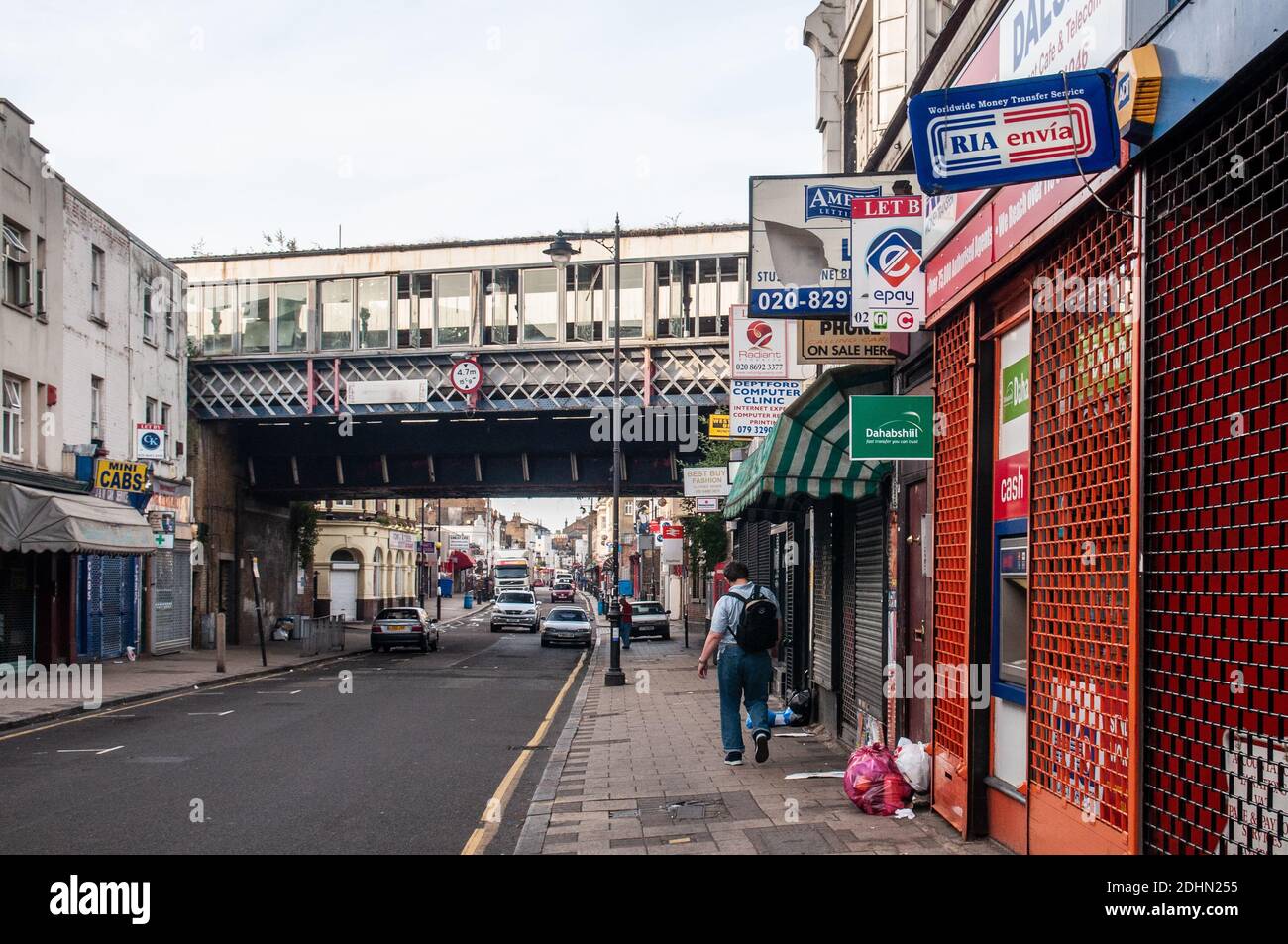London, England, UK - July 1, 2010: Empty shops and low rent businesses line Deptford High Street in South East London following the 'credit crunch' r Stock Photo