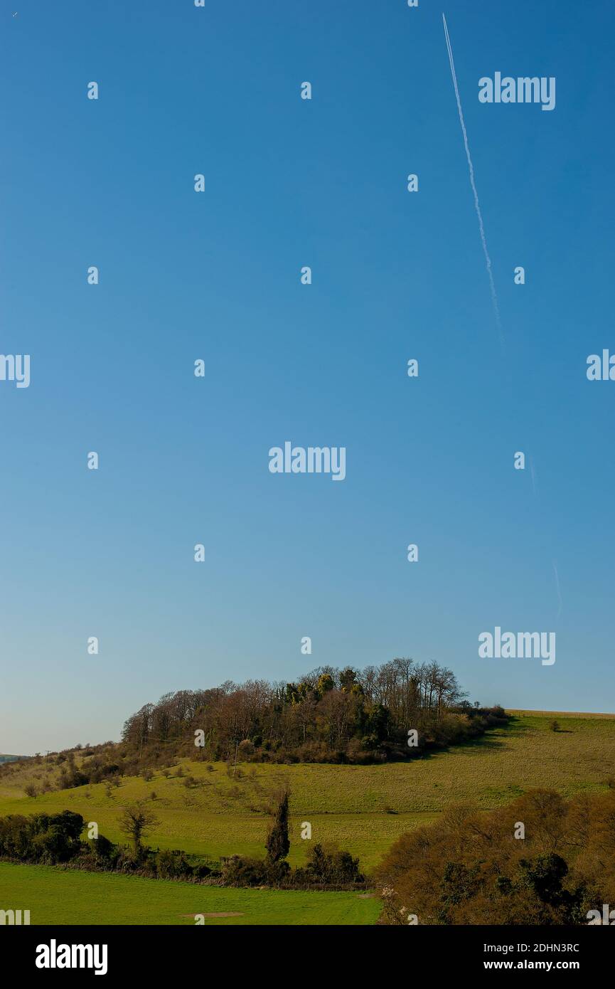 Two Aeroplanes Above Fields In Cloudless Blue Sky Stock Photo