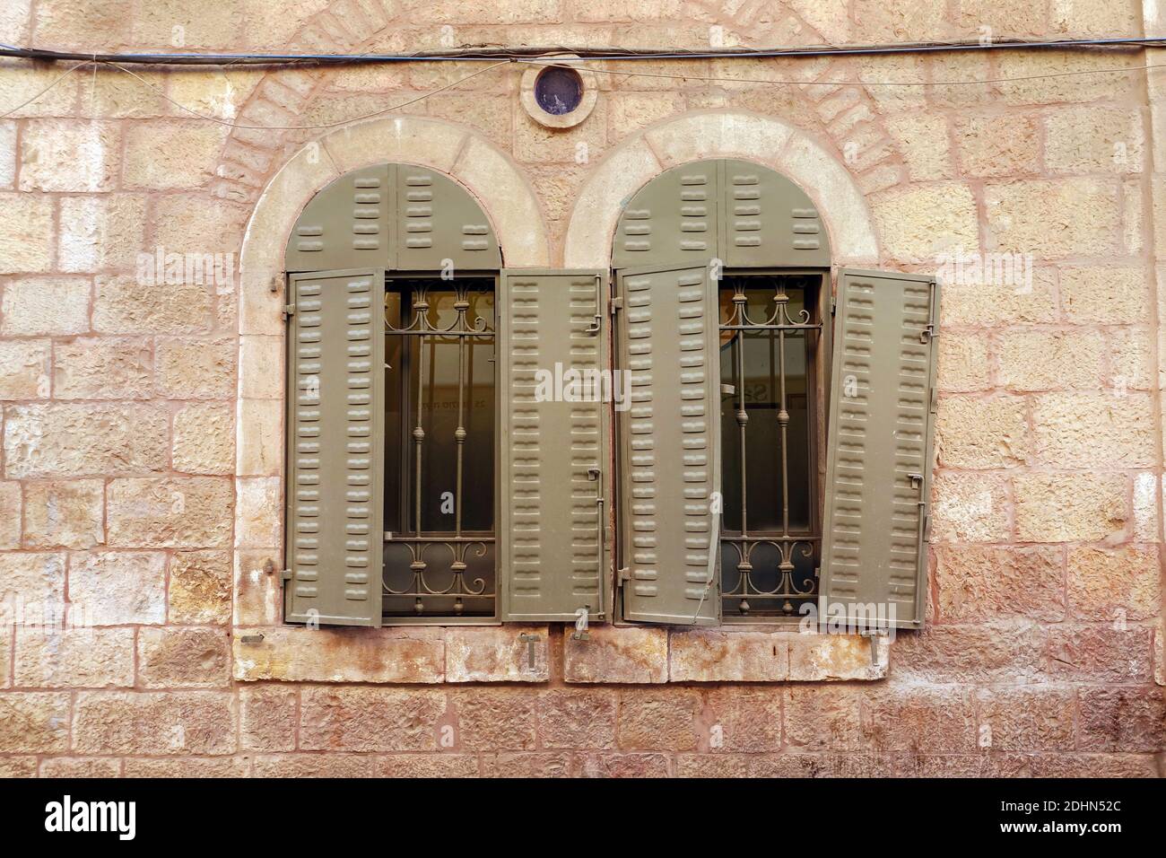 Half open window shutters Stock Photo