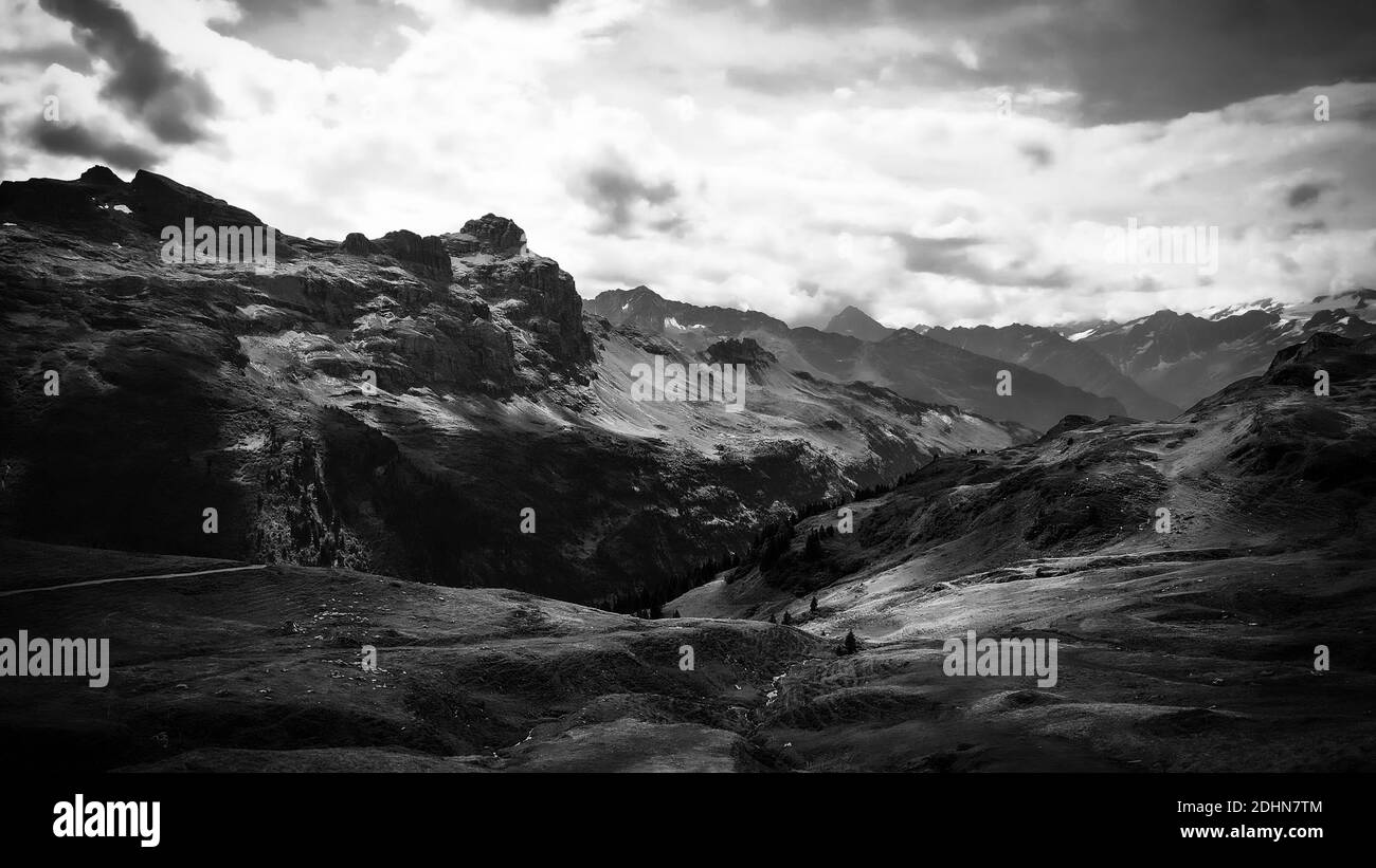 The Swiss Alps at Melchsee Frutt in black and white Stock Photo