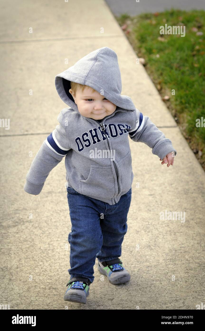 A one-year old boy outdoors Stock Photo