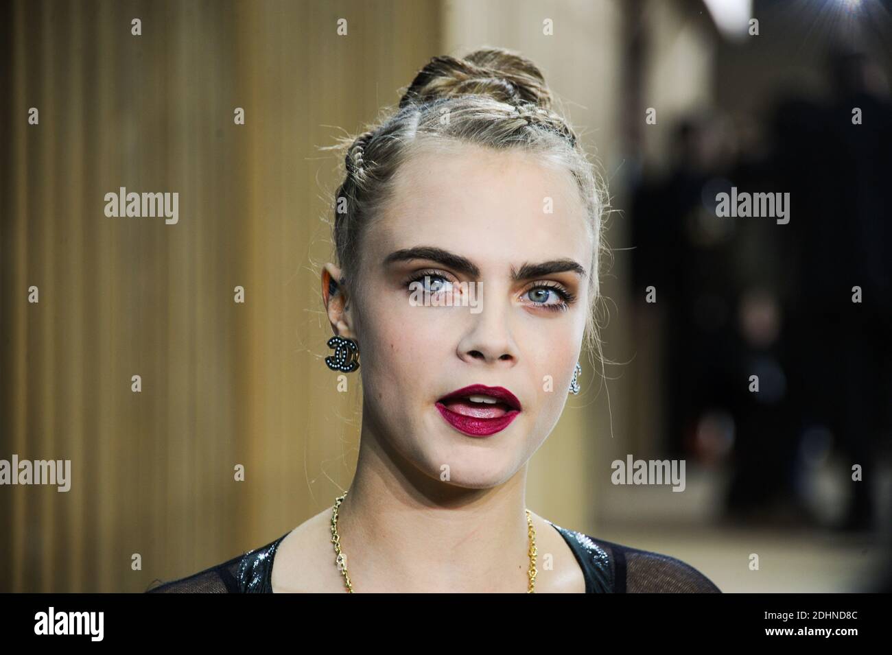 Cara Delevingne attending the Chanel Haute Couture Spring Summer