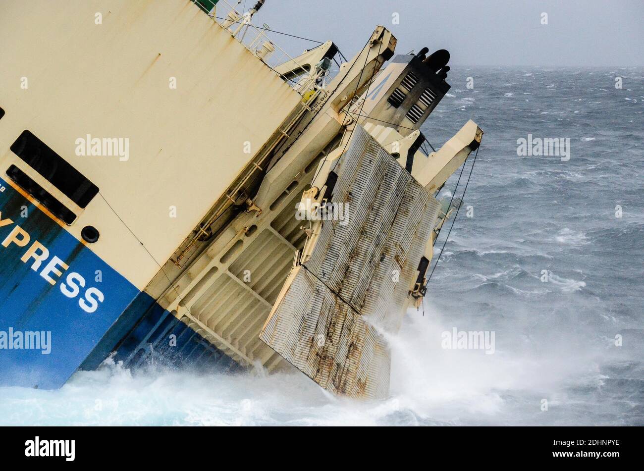 Handout picture shows A salvage team has been dropped by helicopter aboard the Modern Express, January 30, 2016. The Panamanian-flagged pure car and truck carrier (PCTC) Modern Express developed a severe list on Tuesday while underway in the Bay of Biscay on a voyage from Gabon, Africa to the port of Le Havre, France. All 22 crew members were evacuated by Spanish search and rescue helicopters. The ship entered French waters a short time after the rescue and has since been drifting east at a speed of 1 to 3 knots. It is carrying 3,600 tons of timber and construction equipment. Photo by Loic Ber Stock Photo