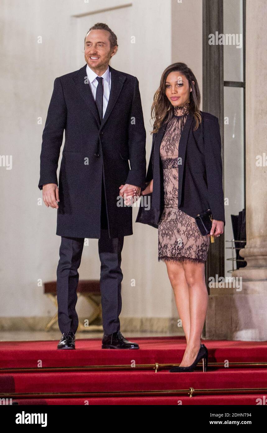 French DJ David Guetta and his companion Jessica Ledon arrive for a state  dinner at the Elysee Presidential Palace in Paris, France on February 1,  2016. Cuban President Raul Castro begins an