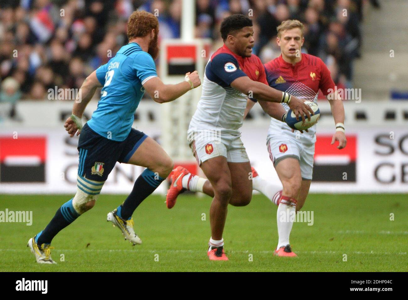 France's centre Jonathan Danty (C) is tackled by Italy's prop Martin Castrogiovanni (R) and Italy's centre Michele Campagnaro (down) during the Six Nations international rugby union match between France and Italy at the Stade de France in Saint-Denis, north of Paris, on February 6, 2016Photo by Christian Liewig/ABACAPRESS.COM/ABACAPRESS.COM Stock Photo