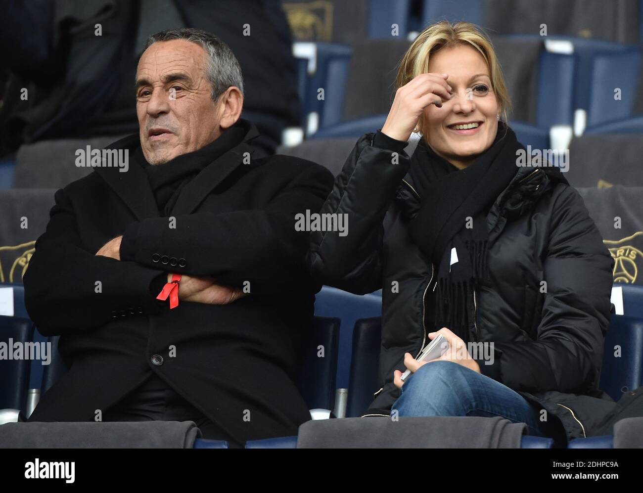 Thierry Ardisson and his wife Audrey Crespo-Mara attending the French First League (L1) football match between Paris Saint-Germain (PSG) and Reims at the Parc des Princes stadium in Paris, France on February 20, 2016. PSG won 4-1. Photo by Christian Liewig/ABACAPRESS.COM Stock Photo