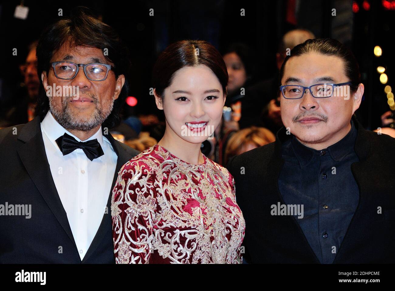 Mark Lee Ping-Bing (L-cameraman of 'Chang Jiang Tu' awarded Silver Bear for Outstanding Artistic Contribution), Xin Zhi Lei and Director Yang Chao attending the Red Carpet before the Closing Ceremony during the 66th Berlinale, Berlin International Film Festival in Berlin, Germany on February 20, 2016. Photo by Aurore Marechal/ABACAPRESS.COM Stock Photo