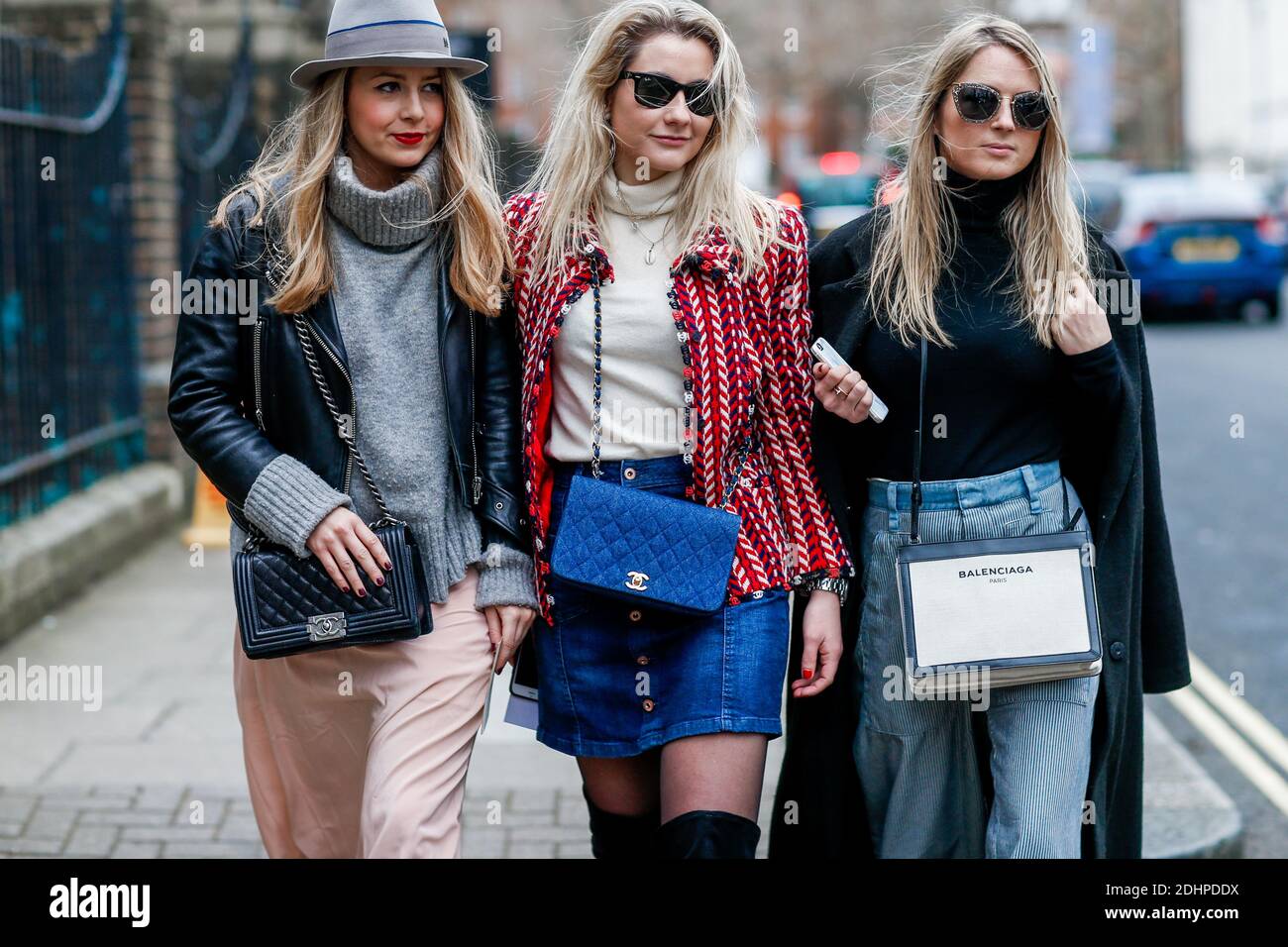 Street style, Caroline Parnot (Pardon my Obsession), Camille Benaroche and  Emilie Higle (My Little Fashion Diary) arriving at Topshop Fall-Winter  2016-2017 show held at Tate Museum, in London, UK, on February 21,