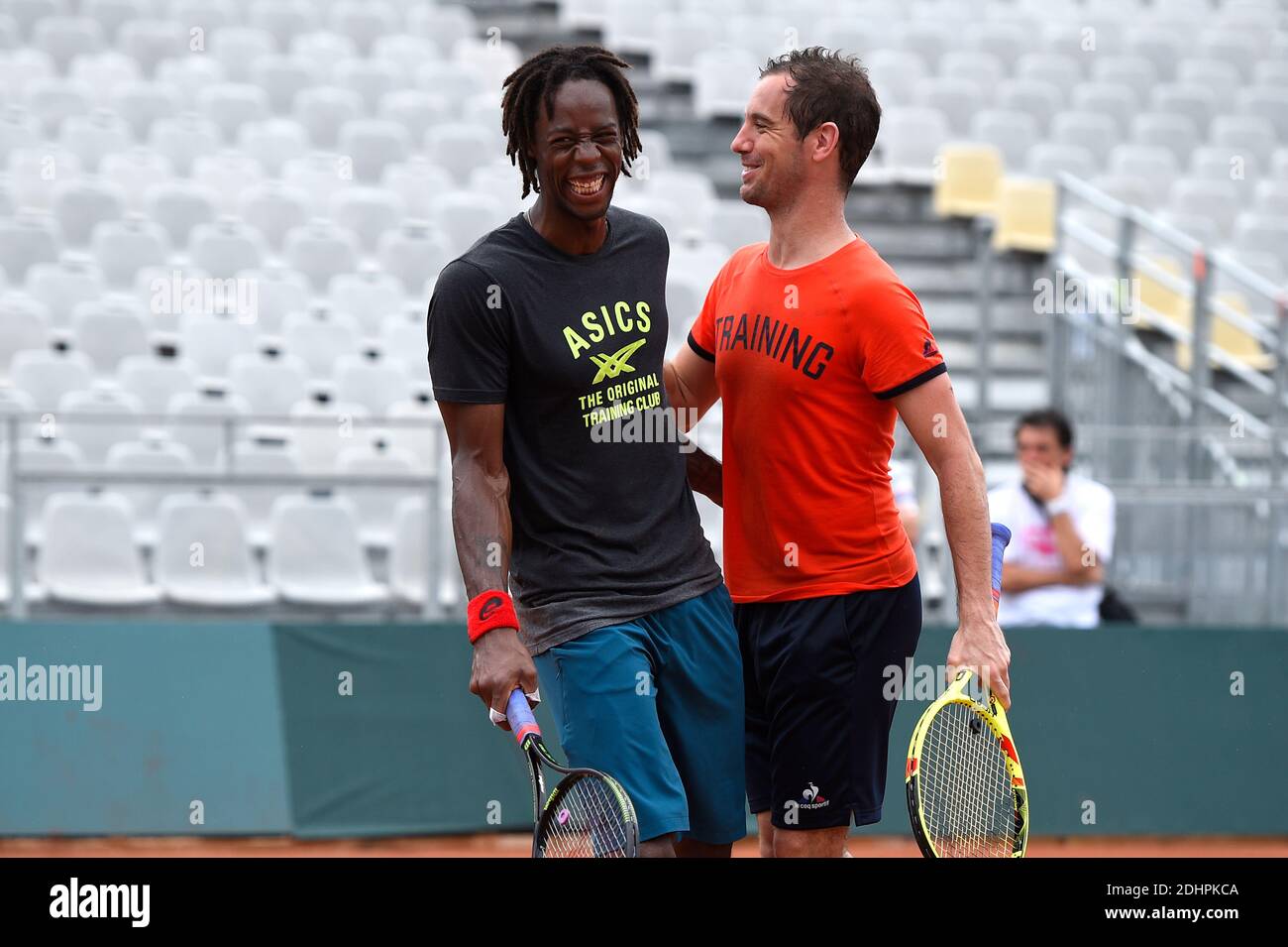 Richard Gasquet and Gael Monfils of France at practice session before the  first round tie against Canada at the Stade Amede Detraux in Baie-Mahault,  Guadeloupe, France on February 29, 2016. Photo by