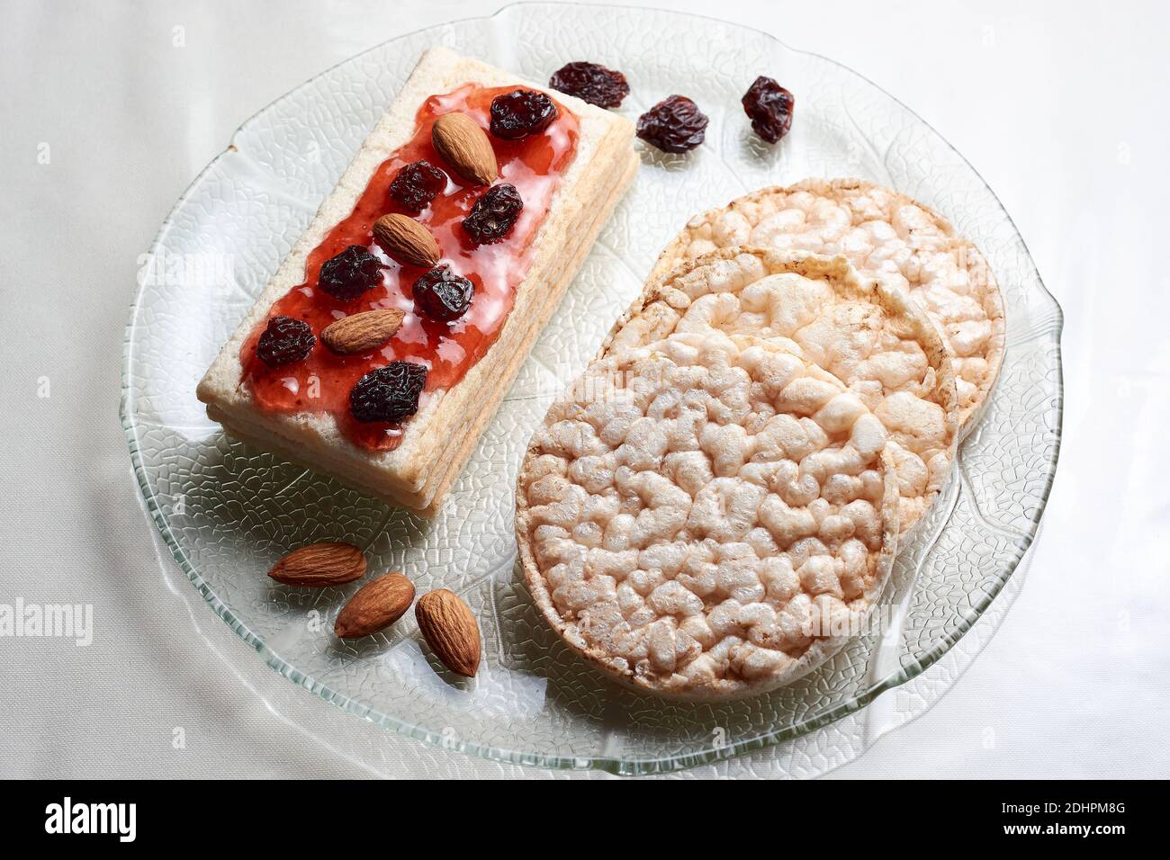 Gluten free diet rice cakes and rice toasts with strawberry jam