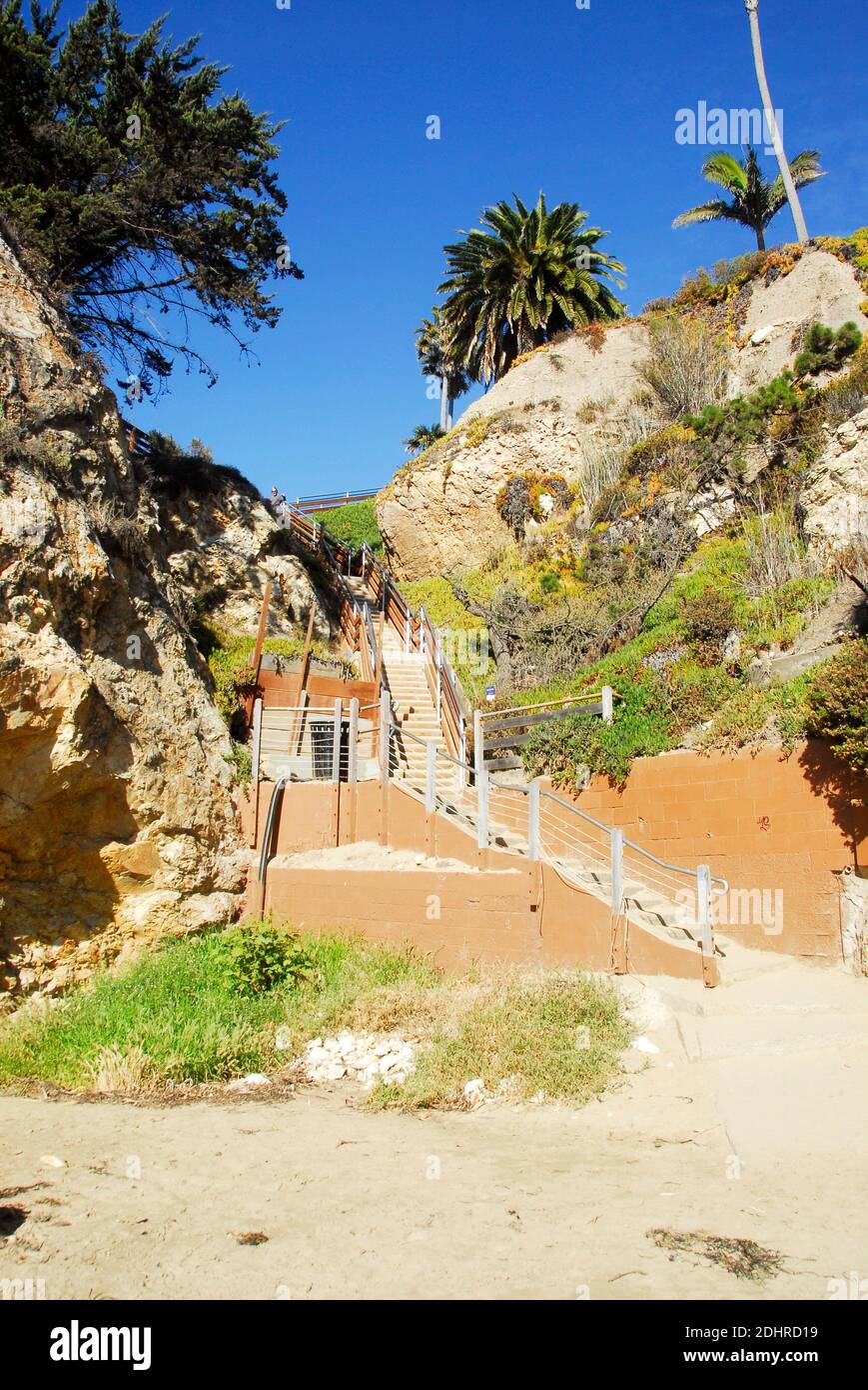 Stairs going down to the beach from clifftop hotel in Pismo Beach, famous for its Pismo Clams, beaches, and sand dunes. Stock Photo